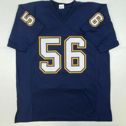 Dark blue custom jersey with white and gold 56 numerals from a professional sports league
