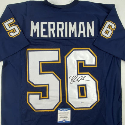 Navy blue custom jersey signed by a pro athlete, perfect for sports fans