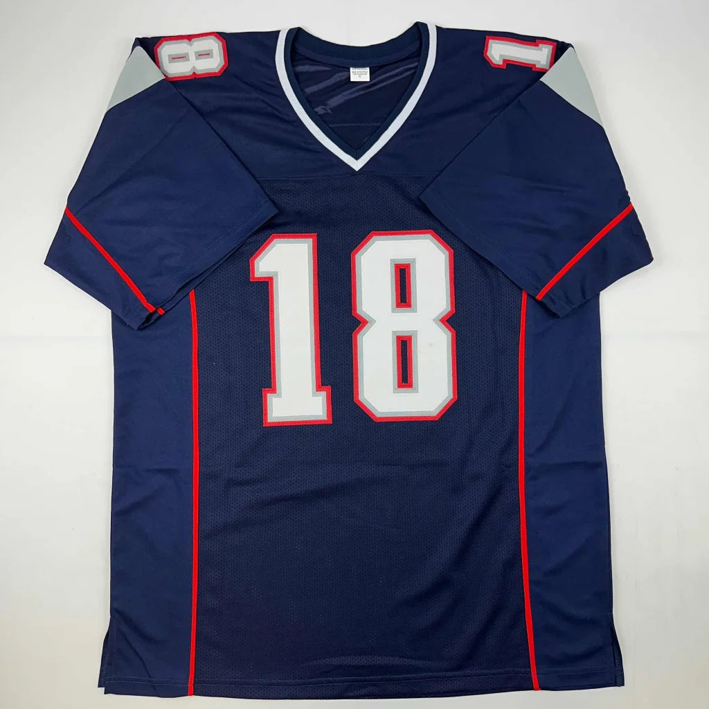 Navy blue custom jersey with red and white accents from a professional sports league