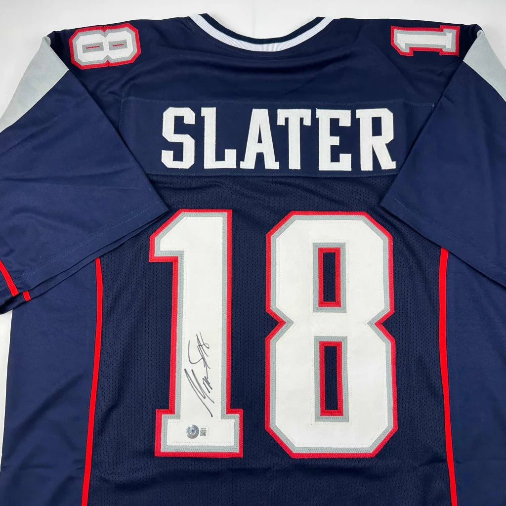 Custom navy blue football jersey with number 18 and signature from a pro sports league