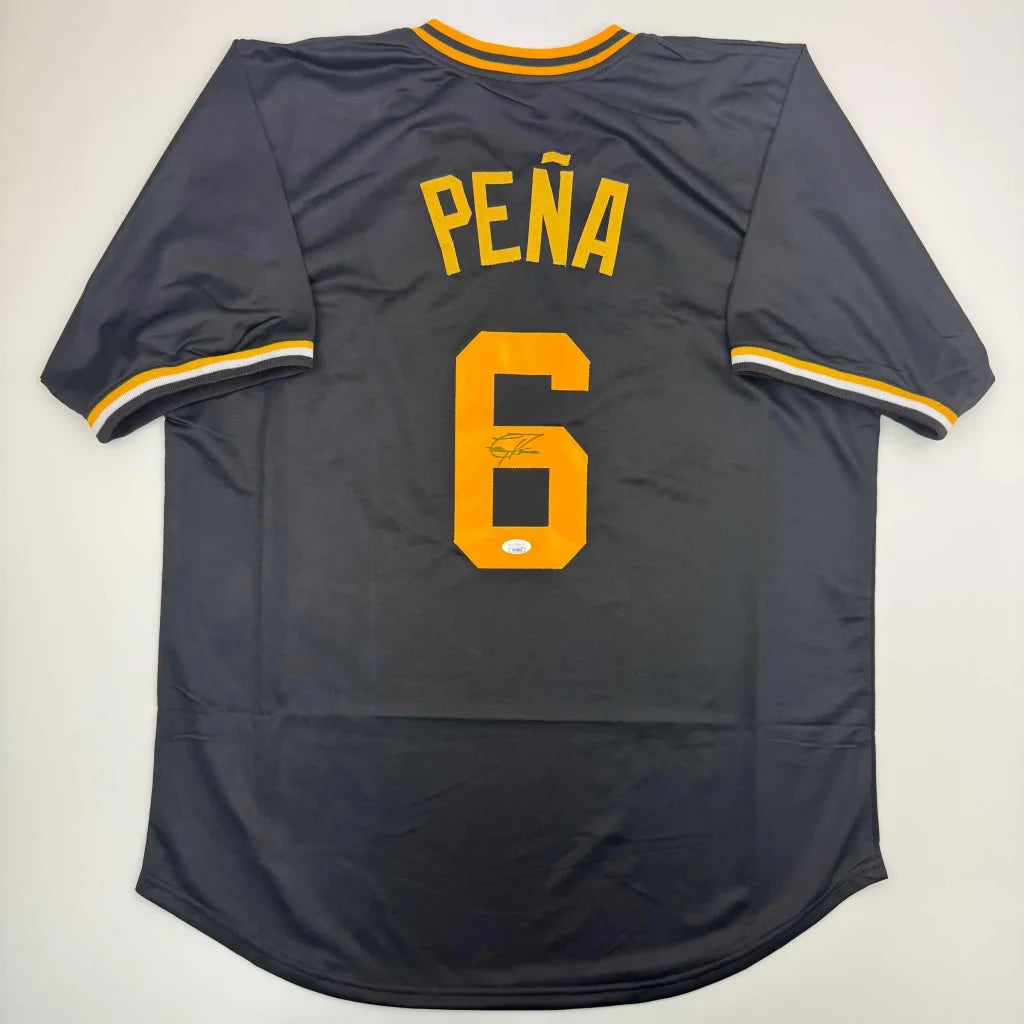 Navy blue custom jersey number 6 Peña with yellow accents and JSA logo