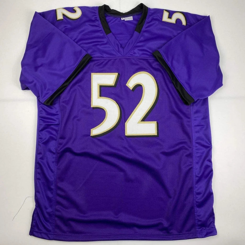 Purple custom jersey with gold trim and number 52, perfect for professional sports fans