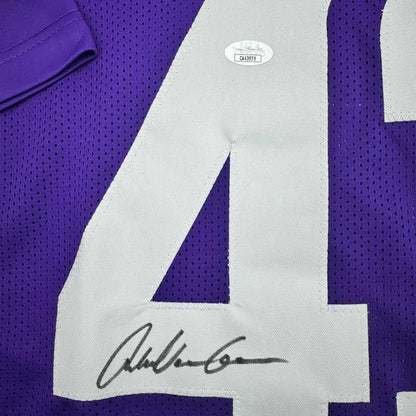 Purple custom jersey with white number 4 for professional sports league