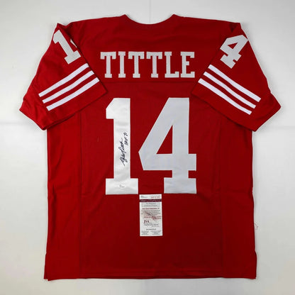 Red and white autographed football jersey from a professional sports league, custom jersey style