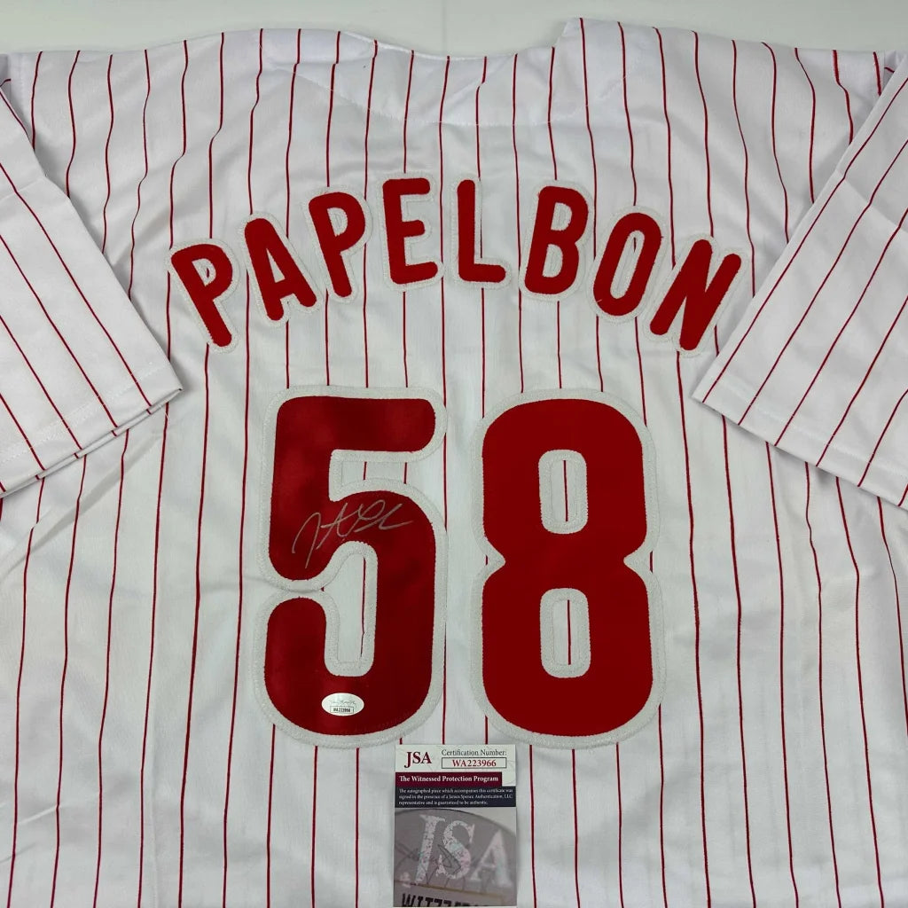 White pinstriped baseball jersey with red lettering, perfect for custom sports gear