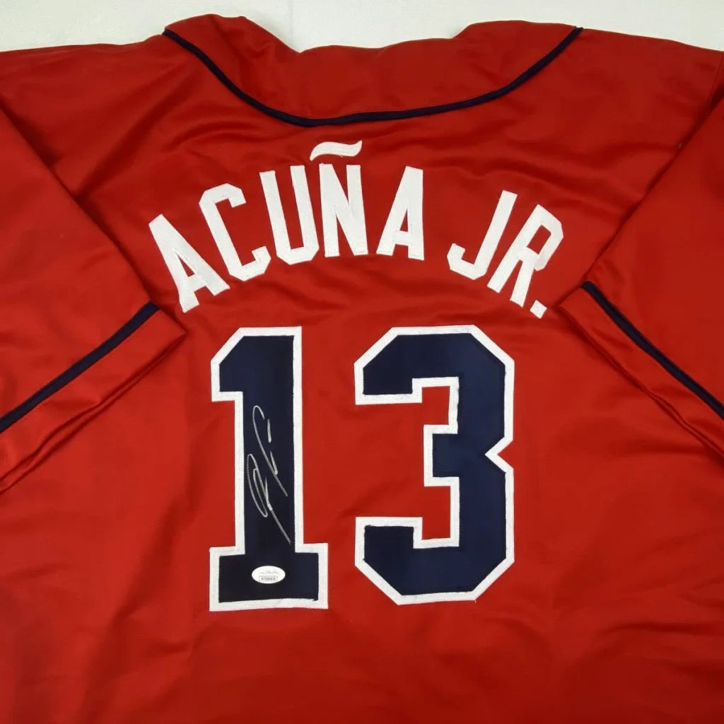 Red custom jersey signed by Acuna Jr with number 13, perfect for professional sports fans