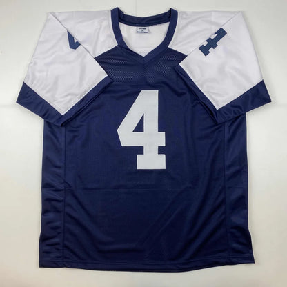 Custom jersey signed by Dak Prescott, number 4 navy blue white pro football