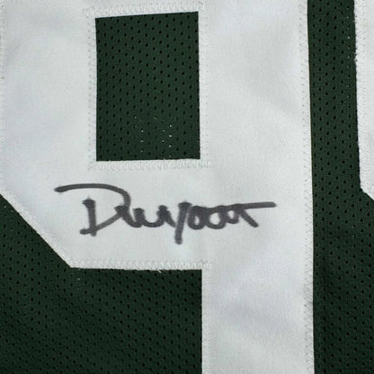 Custom jersey with black ink Dunwoody signature on green white athletic top