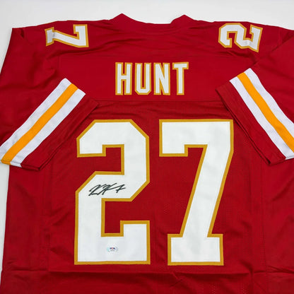 Red Kansas City Chiefs custom jersey signed by Hunt, pro sports league star