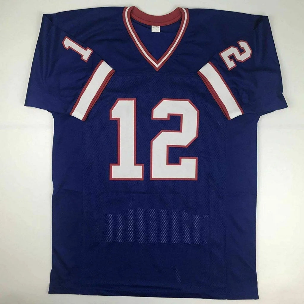Blue custom jersey signed by James Edward Kelly with white and red accents, number 12