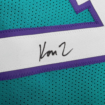 Custom green purple mesh jersey signed by Knueppel #7 for professional sports
