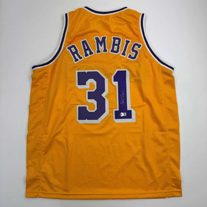 Custom Lakers jersey signed by Phil Jackson, yellow with purple accents