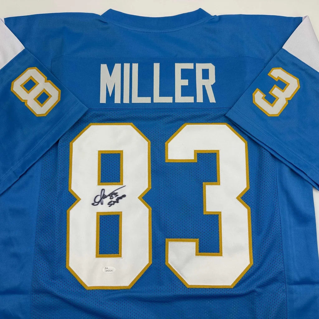 Signed blue and white custom jersey with gold accents by Miller