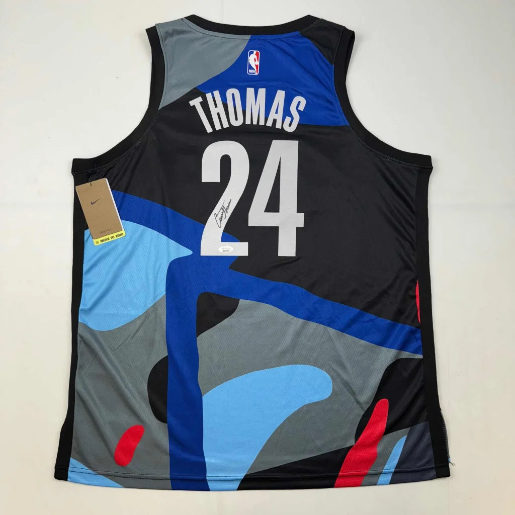 Autographed black and blue Nike custom jersey by Larry Johnson and Paul Pierce
