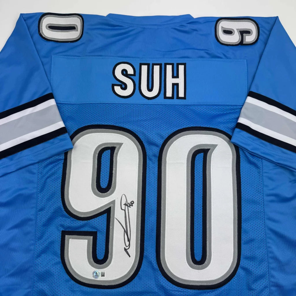Autographed Ndamukong Suh custom jersey, number 90, blue and white