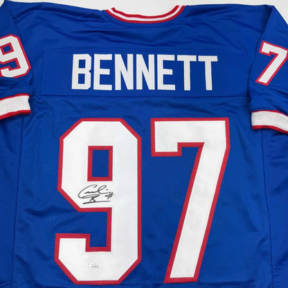 Blue custom jersey signed by NFL legend Carl Eller, name Bennett 97