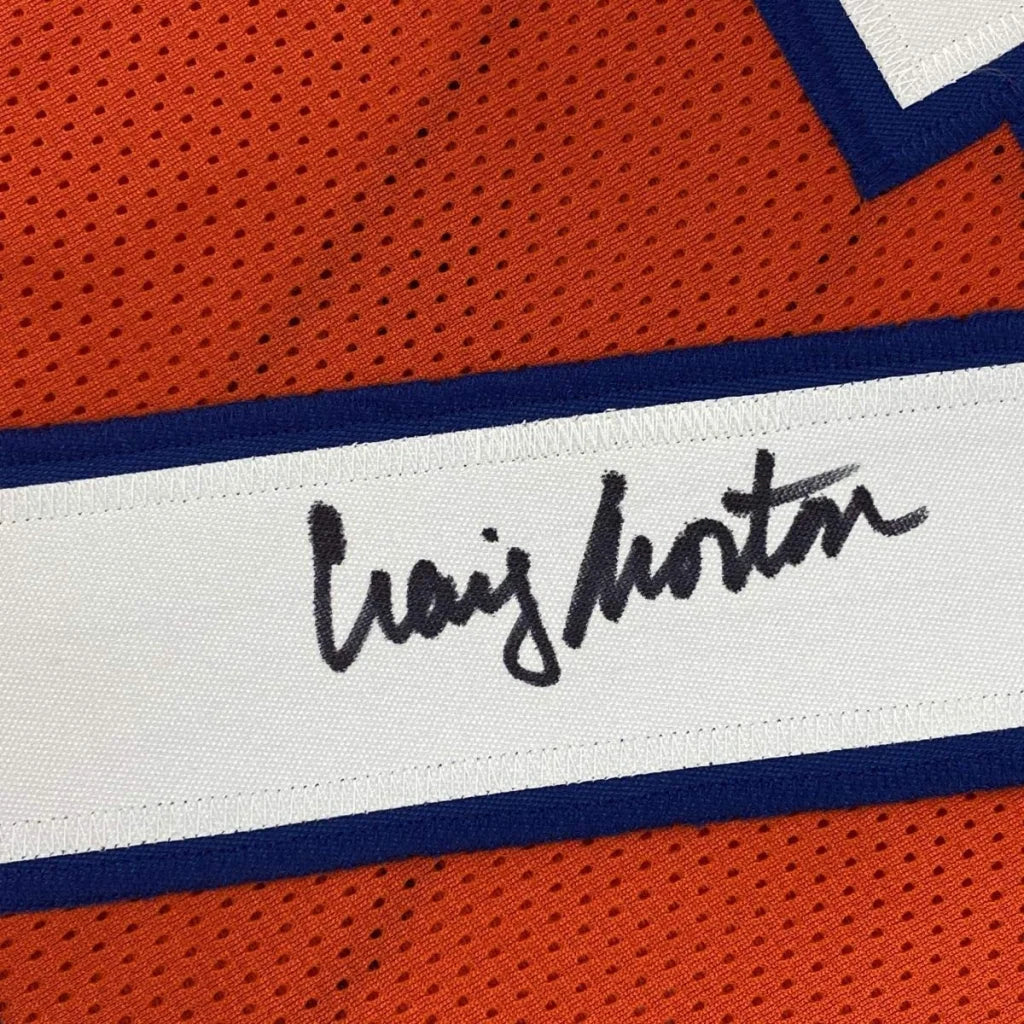 Orange and white custom jersey signed by NFL legend Craig Morton for professional sports fans