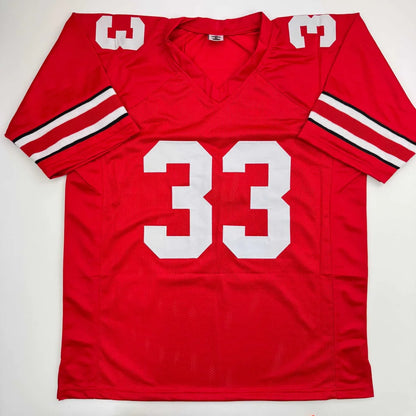 Red custom jersey with white stripes, number 33, signed by Sawyer