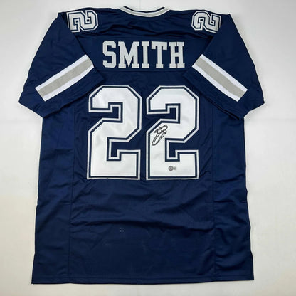 Dark blue custom jersey with white trim and number 22 autographed, perfect for sports fans