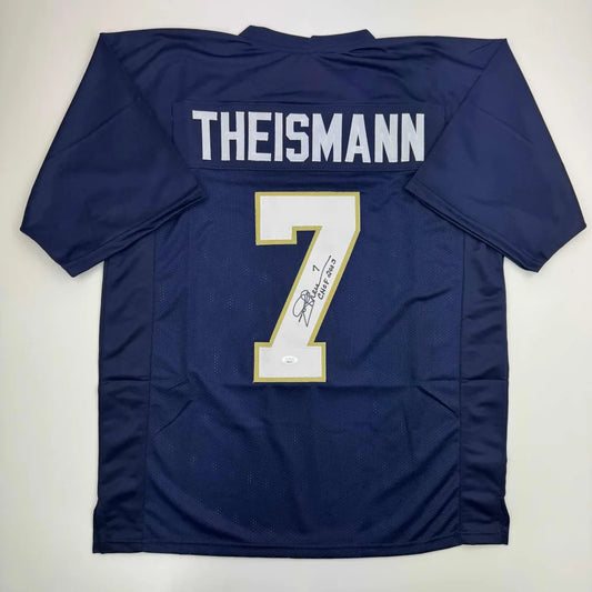 Dark blue custom jersey with THEISMANN Nameplate and autographed number 7 for pro sports