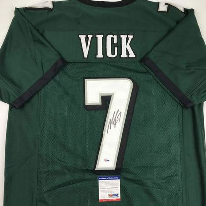 Autographed dark green custom jersey with VICK 7 for sports league fans