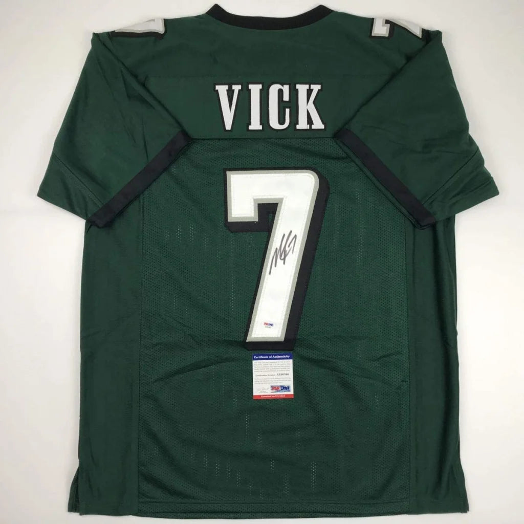 Autographed green custom jersey with VICK 7 for football fans and pro sports collectors