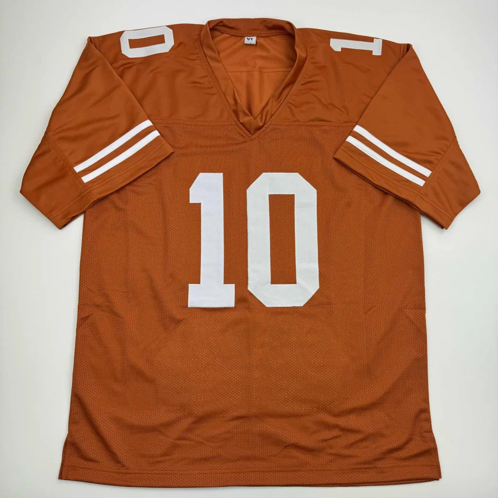 Orange custom jersey with white number 10 and arm stripes from Vince Young Texas Longhorns professional sports collectible