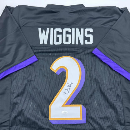 Black custom jersey with Wiggins 2 in white, purple gold trim