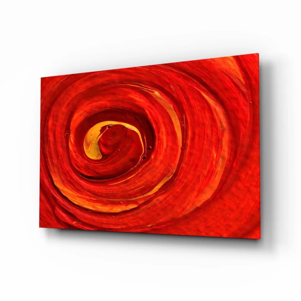 Vibrant red orange fiery spiral glass wall art with glossy abstract swirls
