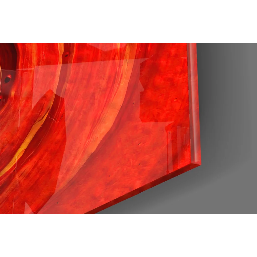 Vibrant fiery spiral glass wall art with glossy red orange swirls