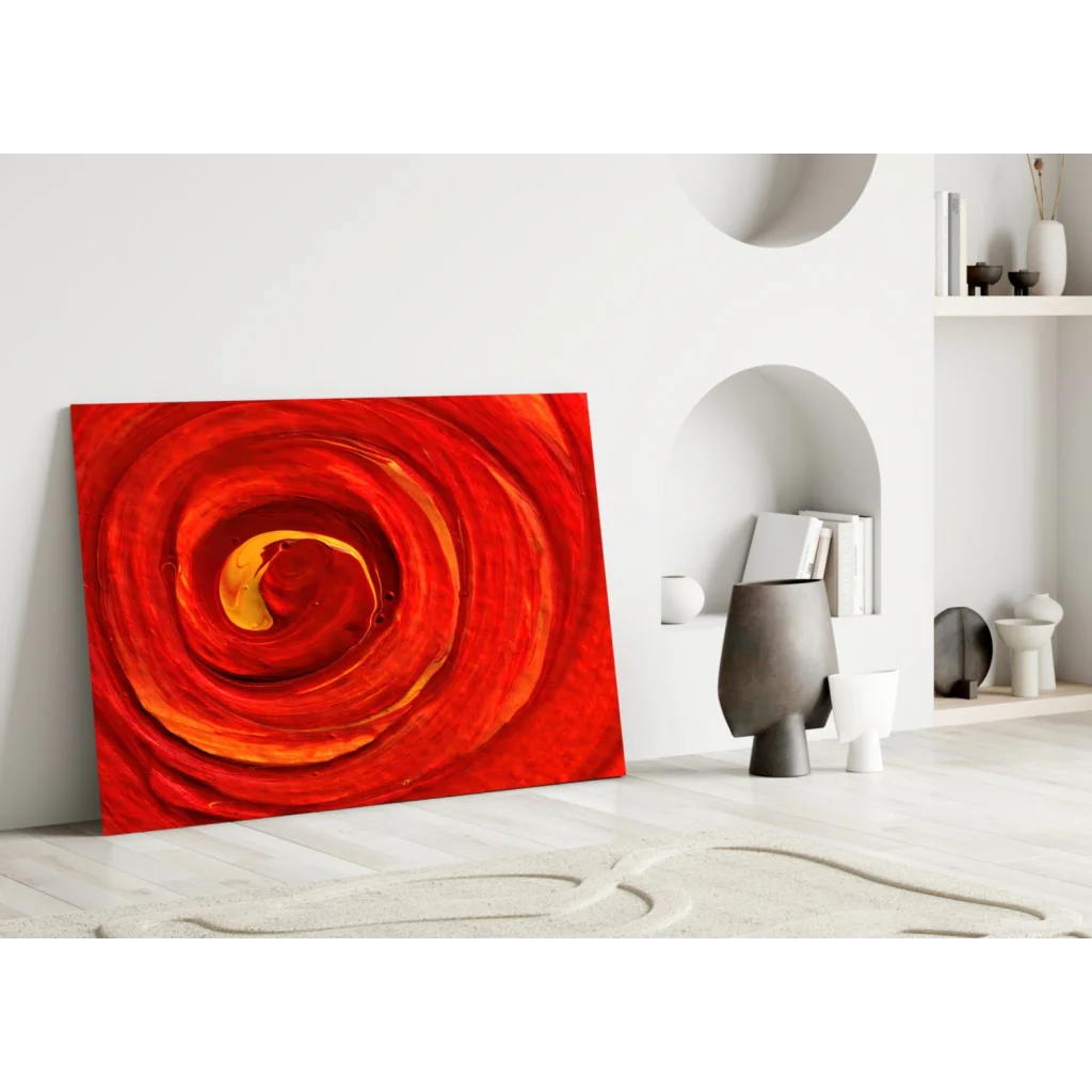 Vibrant red and orange fiery spiral glass wall art with glossy abstract swirls