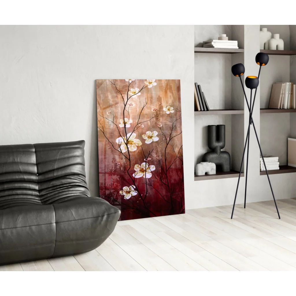 Stunning glass wall art of white blossoms on dark branches, warm brown to red gradient
