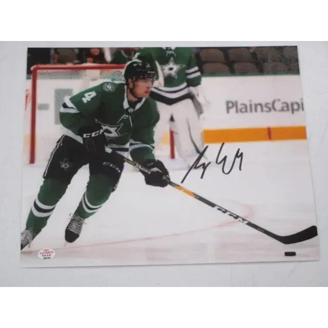 Dallas Stars signed autographed 8x10 photo of player in green uniform with certificate