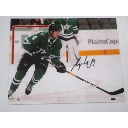 Dallas Stars signed autographed 8x10 photo of player in green uniform with certificate