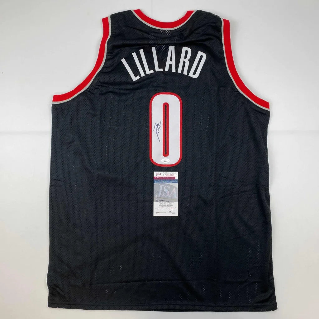 Damian Lillard signed black jersey with red accents and white Lillard name