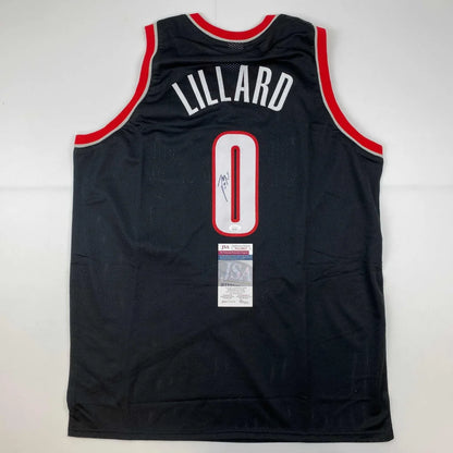Damian Lillard signed black jersey with red accents and white Lillard name