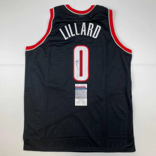 Damian Lillard signed black jersey with red accents and white Lillard name