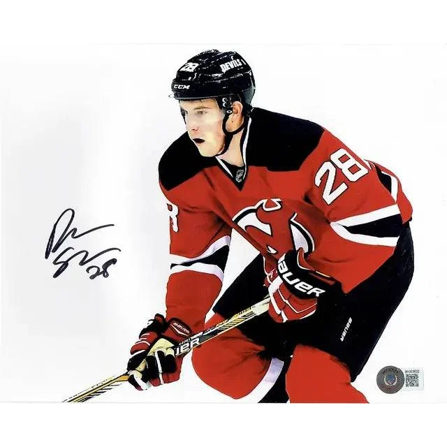 Damon Severson signed Jersey Devils photo with Beckett Holo autographed hockey player