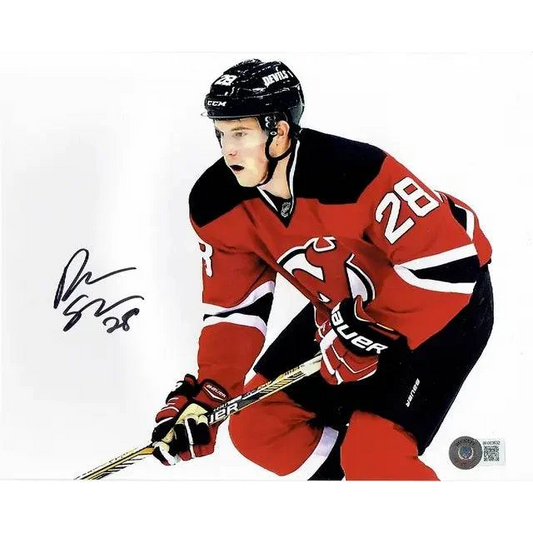 Damon Severson signed Jersey Devils photo with Beckett Holo autographed hockey player