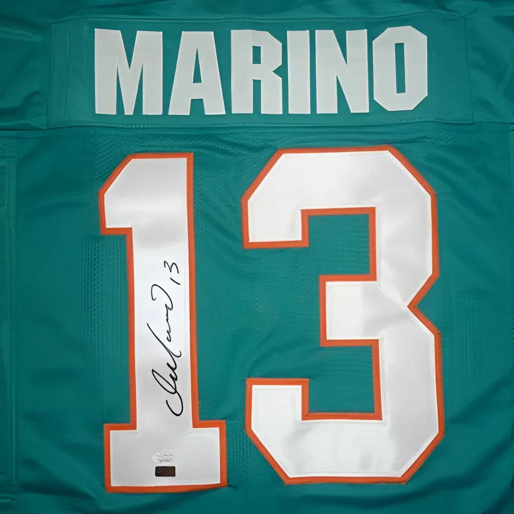 Back of teal miami dolphins autographed custom jersey featuring dan marino name number 13 and signature jsa