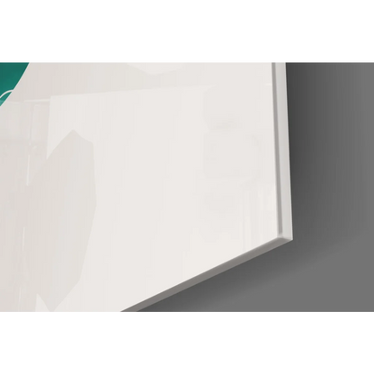 Stunning teal and bronze glass wall art with white frame and glossy teal accent