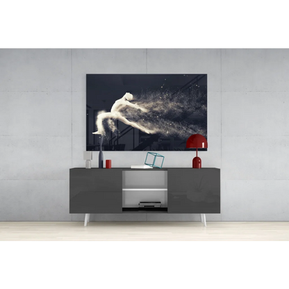 Dynamic dancer glass wall art on modern gray console table with white legs