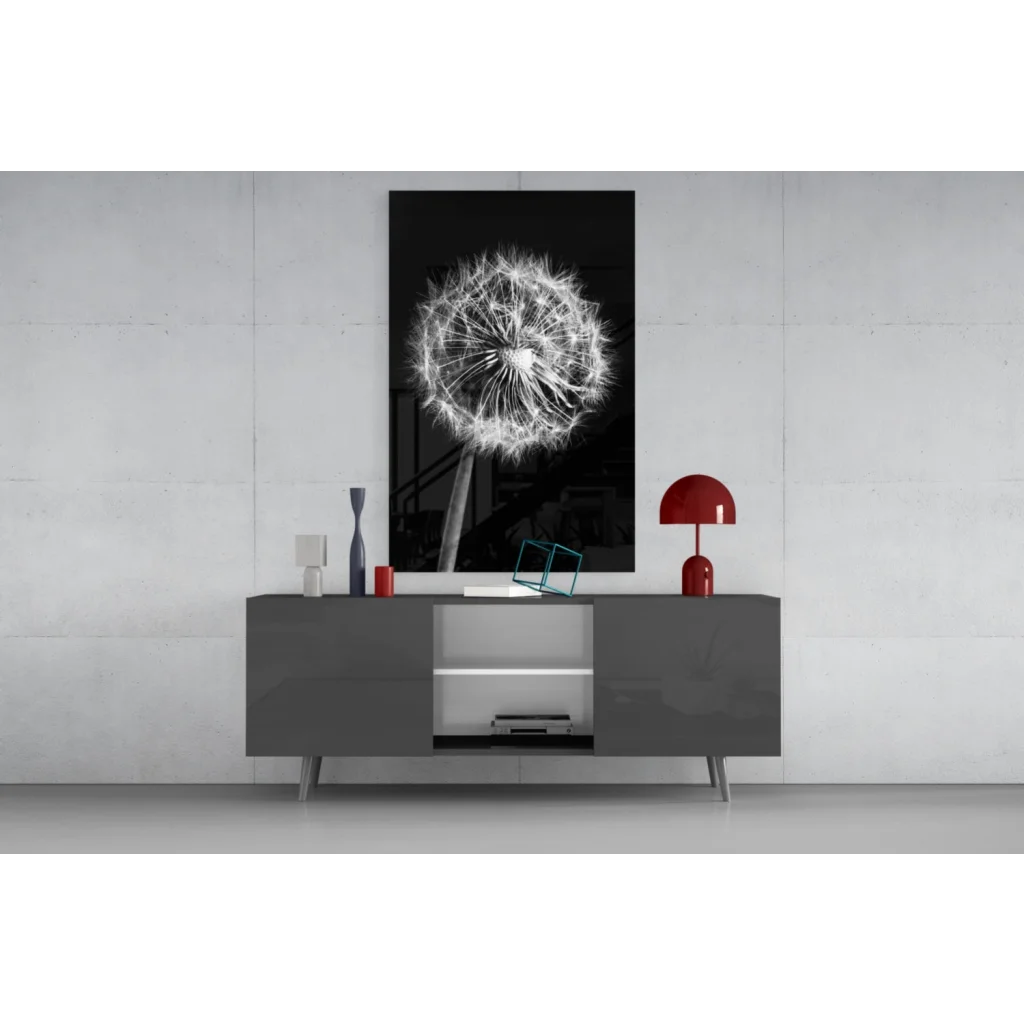 Black-and-white dandelion glass wall art on gray console