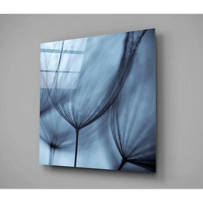 Blue dandelion glass wall art with abstract translucent fan design