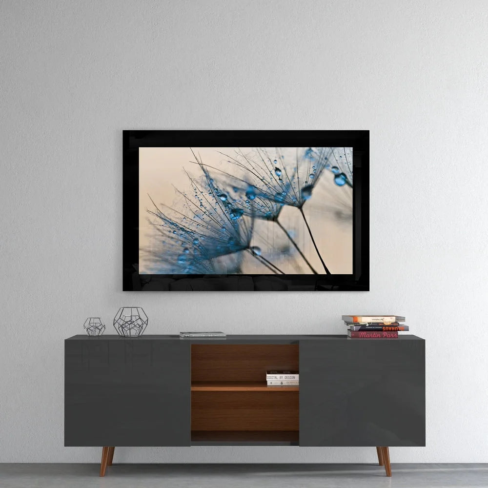 Stunning blue dandelion glass wall art with water droplets in black frame