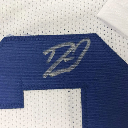 Autographed white and blue custom jersey from a professional sports league collectible