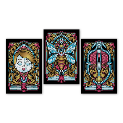 David Dastmalchian deluxe edition art prints with stained-glass style artworks of a cracked doll, bee with an eye, and needle and thread