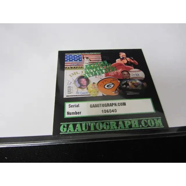 Authentication sticker with serial 106040 on David Robinson autographed 8x10 photo