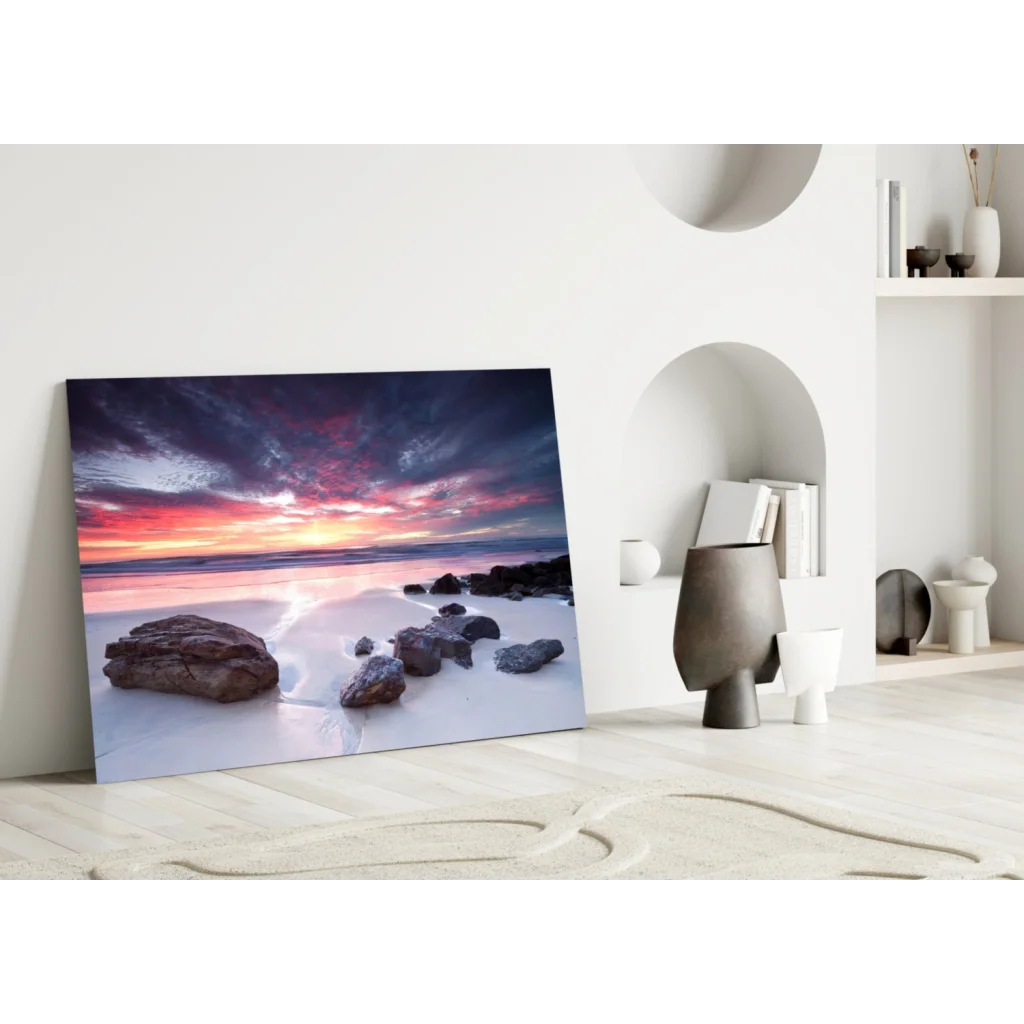Vibrant sunset beach wall art canvas with pink orange purple skies over calm ocean rocks