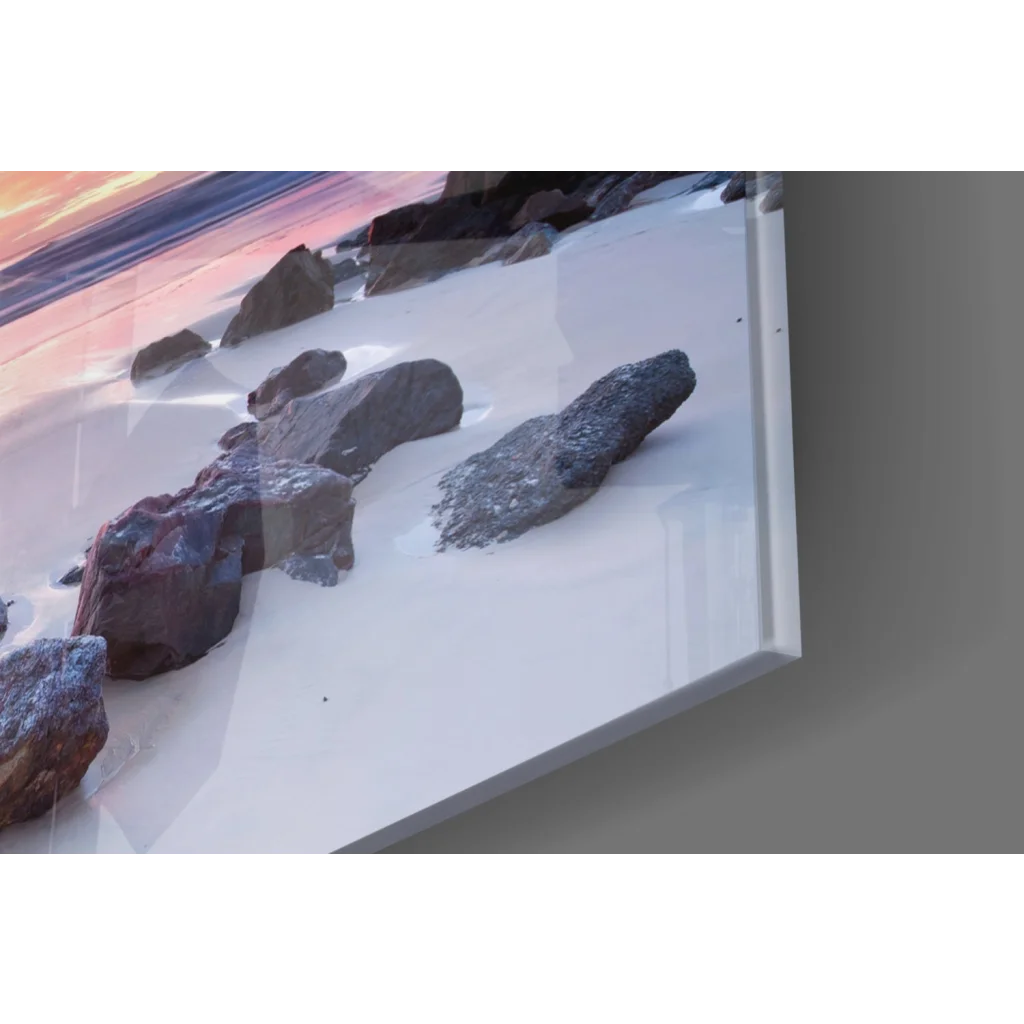 Framed sunset beach glass wall art with rocks and purple skies